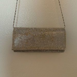 Bedazzled clutch with shoulder strap